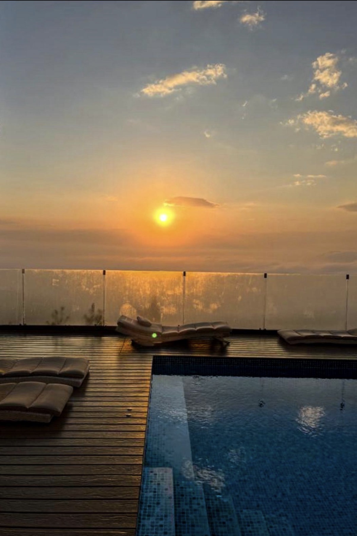 Galilee Hills pool overlooking the Sea of Galilee at sunset